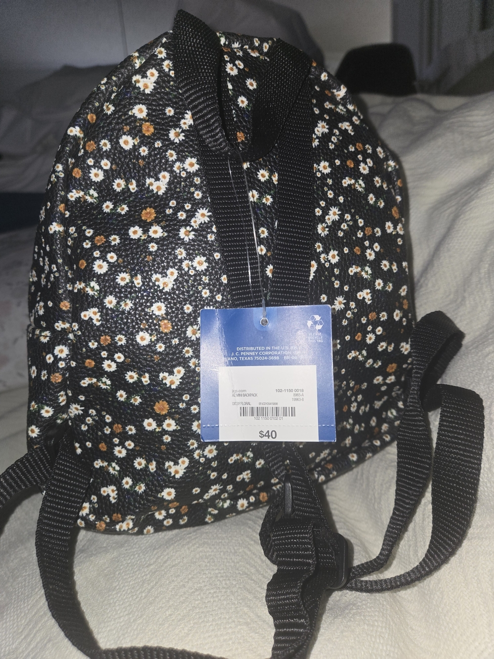 Arizona Jean Company Black Mini Backpack with White and Brown Daisy Print